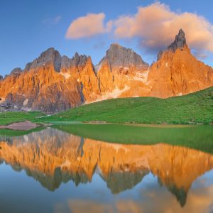 The breathtaking north-western face of the Pale di San Martino at sunset. On the left, the Segantini Refuge, named after the famous painter.