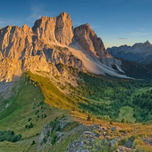 The imposing vertical Northern face of Mount Pelmo at sunset (Dolomites - Italy)